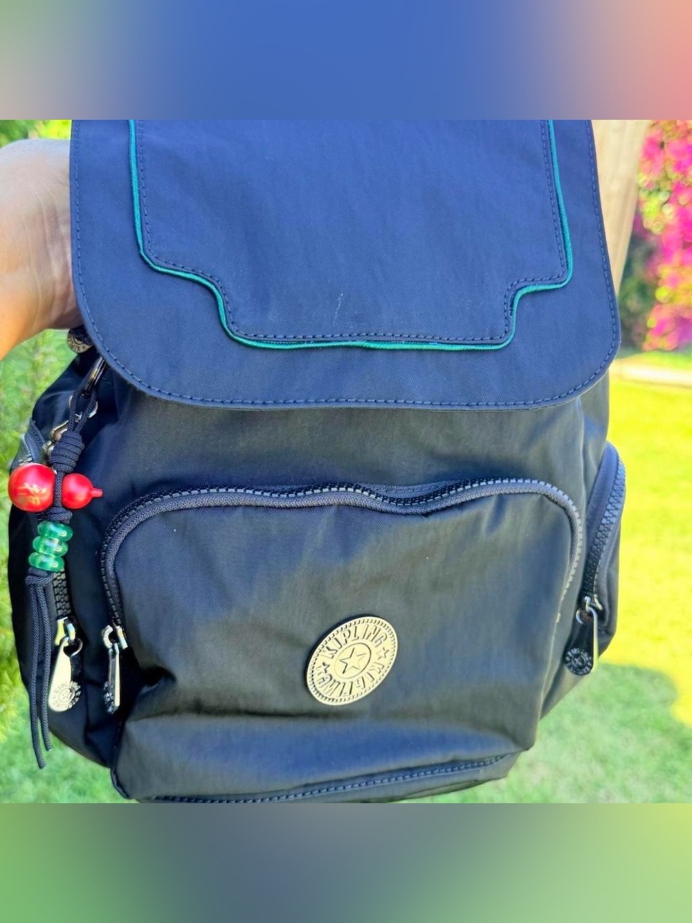 Kipling Navy Backpack with Teal Trim and Red Bead Accents